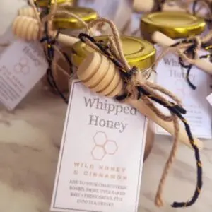 small jars of whipped honey with labels