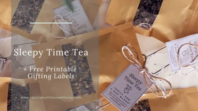 Homemade sleepytime herbal tea blend with chamomile, lavender, and rose petals in glass jars with festive ribbon, ready for holiday gifting