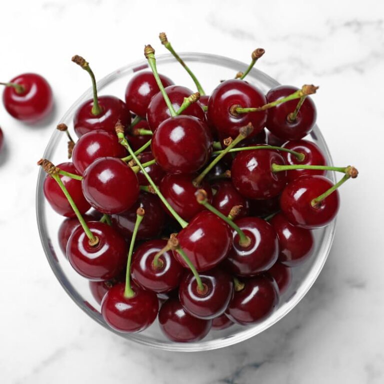 Blending cherry coconut banana smoothie for perimenopause sleep support