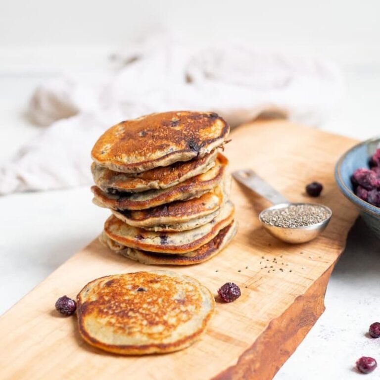 "Stack of protein chia pancakes with blueberries for perimenopause blood sugar support"