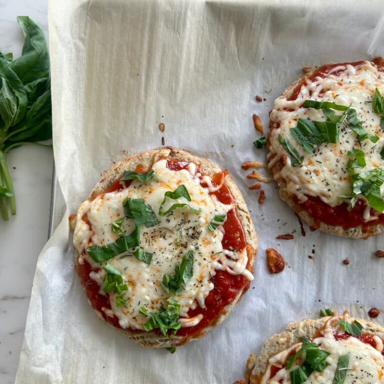 Cottage cheese pizza cut into triangular slices showing crispy golden crust and melted cheese pull