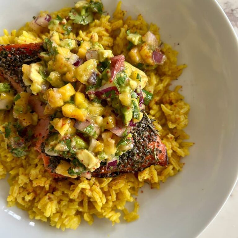 Ingredients for chia-crusted salmon macro bowl including salmon fillets, chia seeds, mango, avocado, and turmeric